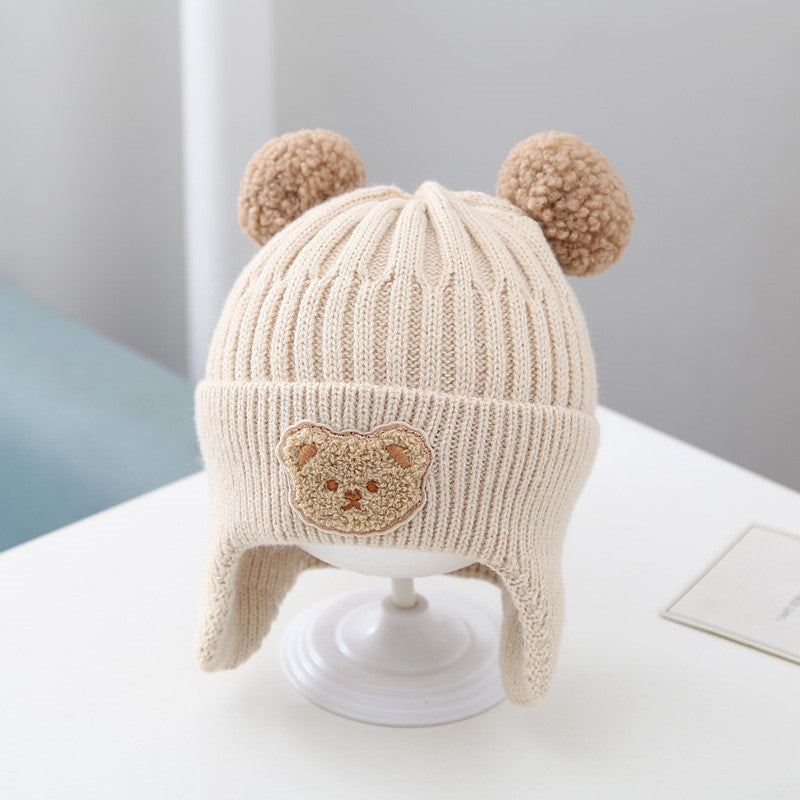 Bonnet chaud cache-oreilles en laine tricoté