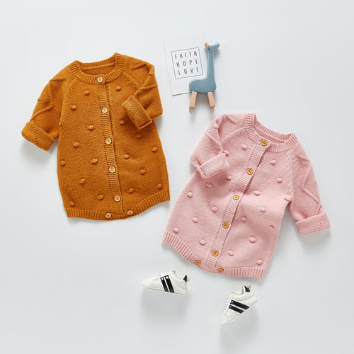 Knitted bodysuit embroidered in thread
