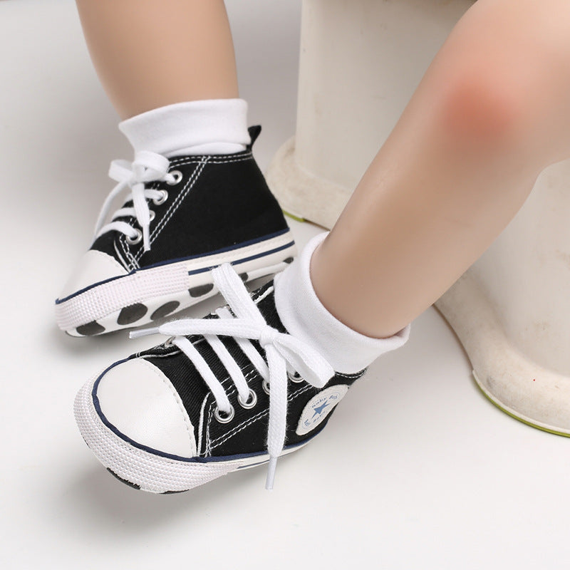 Chaussures à semelles souples en toile