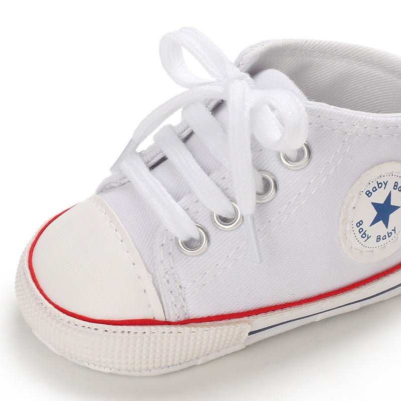Chaussures à semelles souples en toile