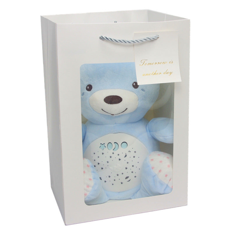 Peluche projecteur d'étoiles bébé pingouin