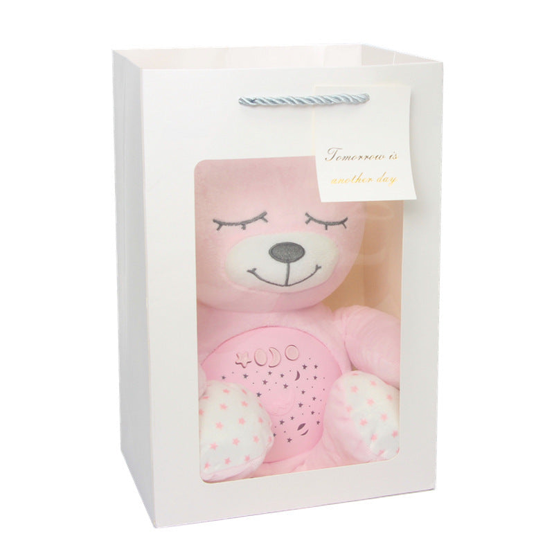 Peluche projecteur d'étoiles bébé pingouin