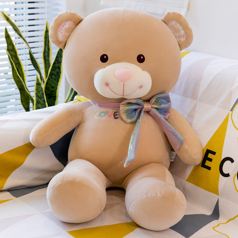 Peluche ours avec nœud papillon de dessin animé