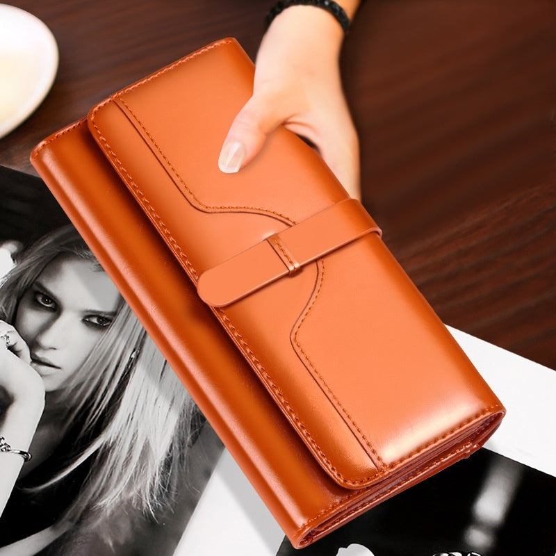 Portefeuille femme à trois volets en cuir