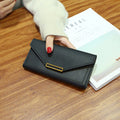 Petit porte monnaie rétro fine à boucle en cuir