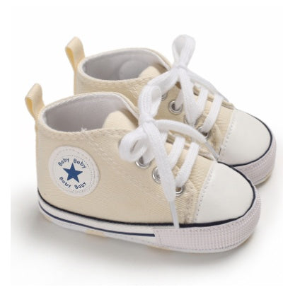 Chaussures à semelles souples en toile